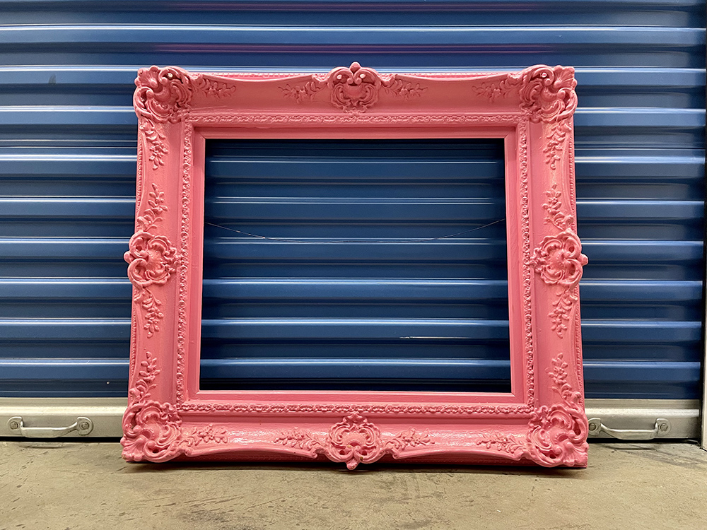 Antique rococo gilt wood and composite gallery frame with ornate detail, airbrushed bubble gum pink.