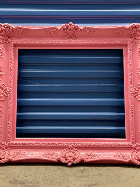 Antique rococo gilt wood and composite gallery frame with ornate detail, airbrushed bubble gum pink.